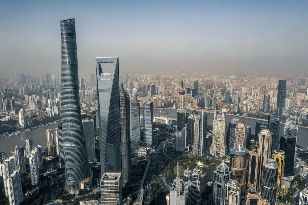 shanghai-world-financial-center-the-third-tallest-building-in-china-surrounded-by-tall-buildings-in-shanghai