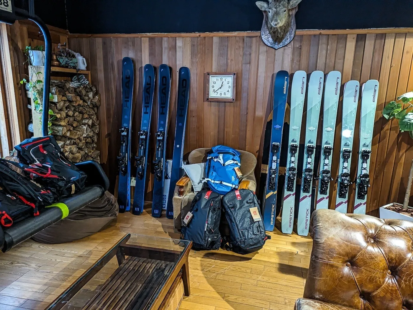 A wooden equipment storage room showing skier’s essential tools
