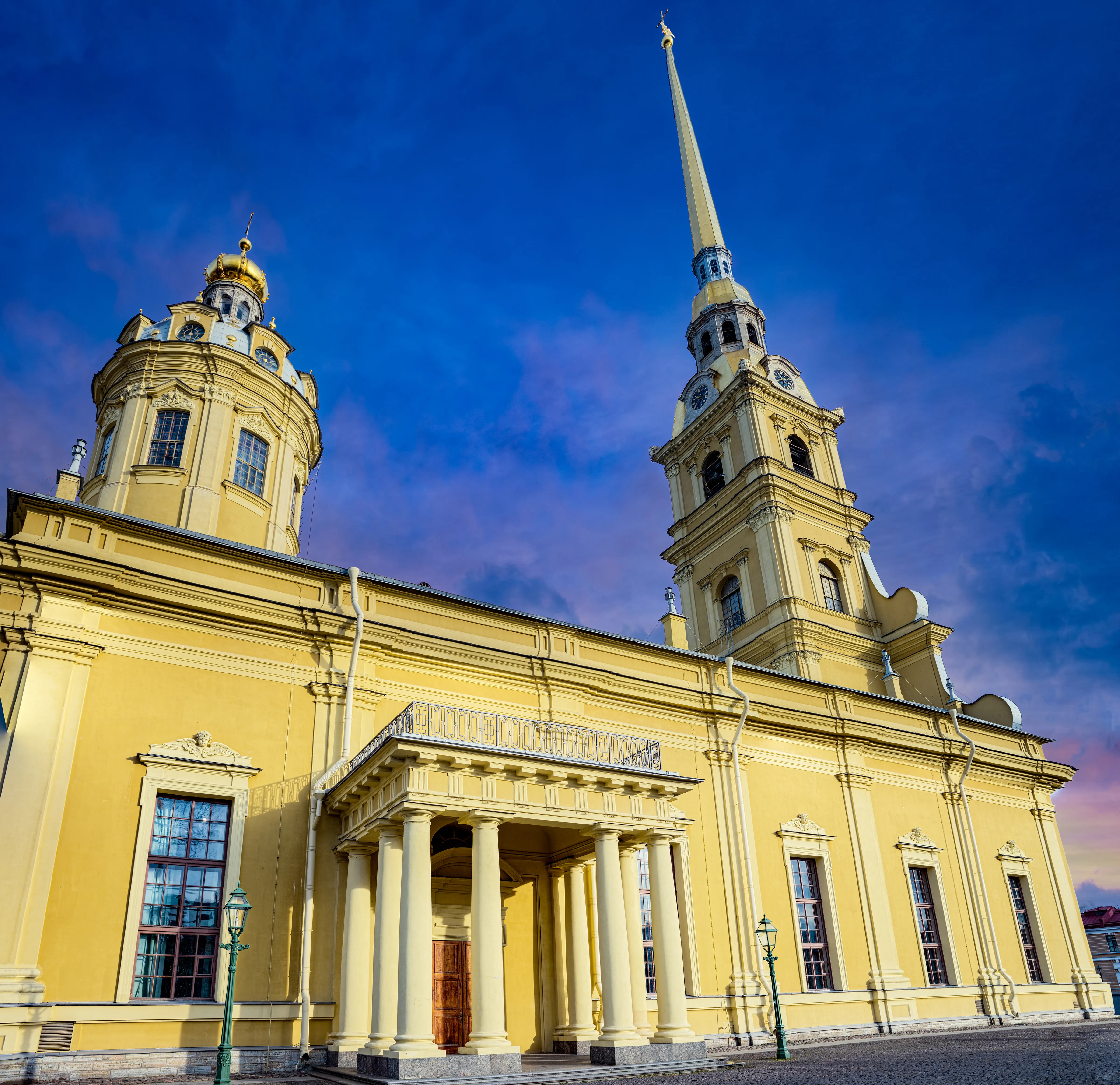 An architectural photograph shows the Peter and Paul Cathedral located inside the Peter and Paul Fortress in Saint Petersburg, Russia
