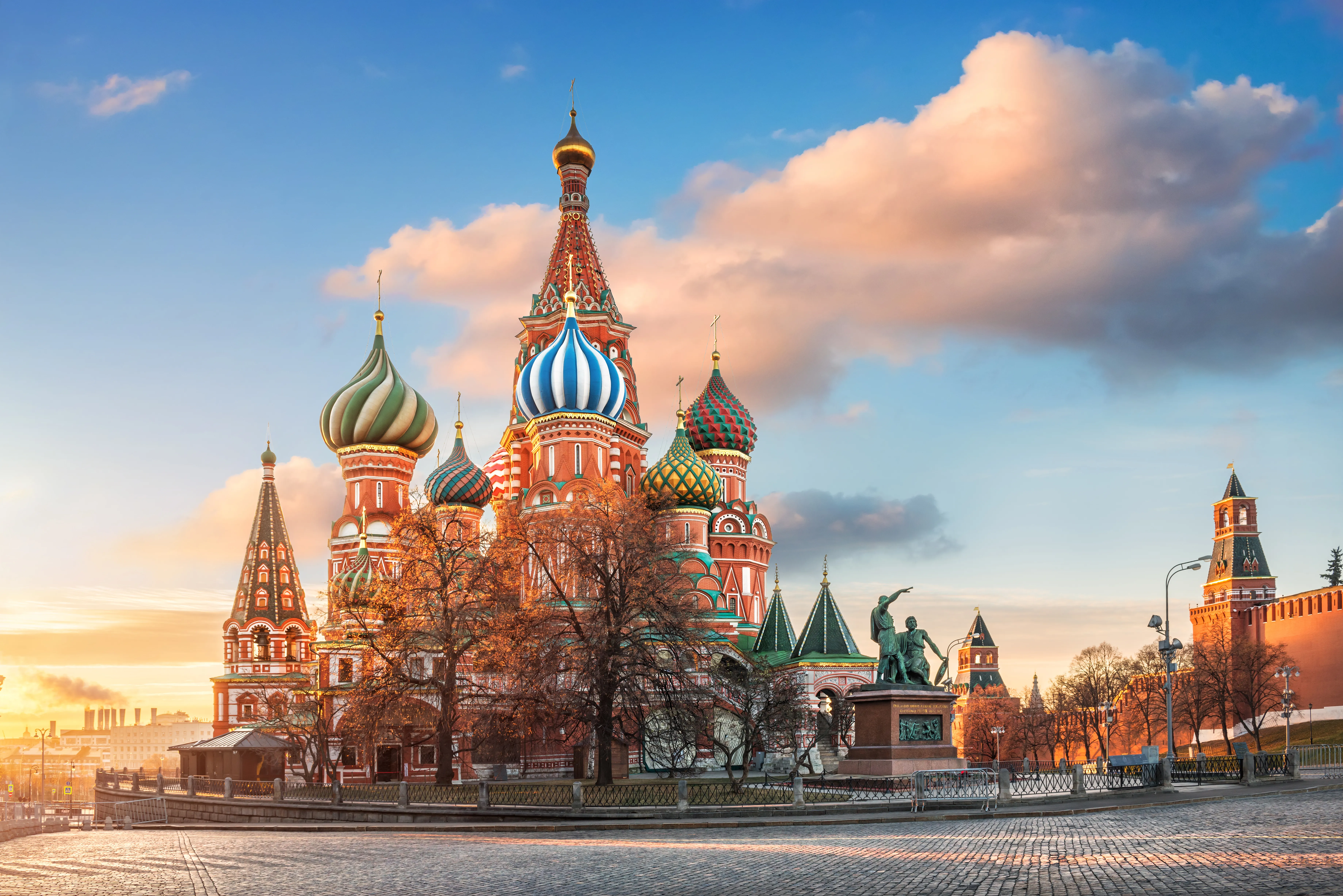 An architectural photograph shows Saint Basil's Cathedral at sunset in Red Square