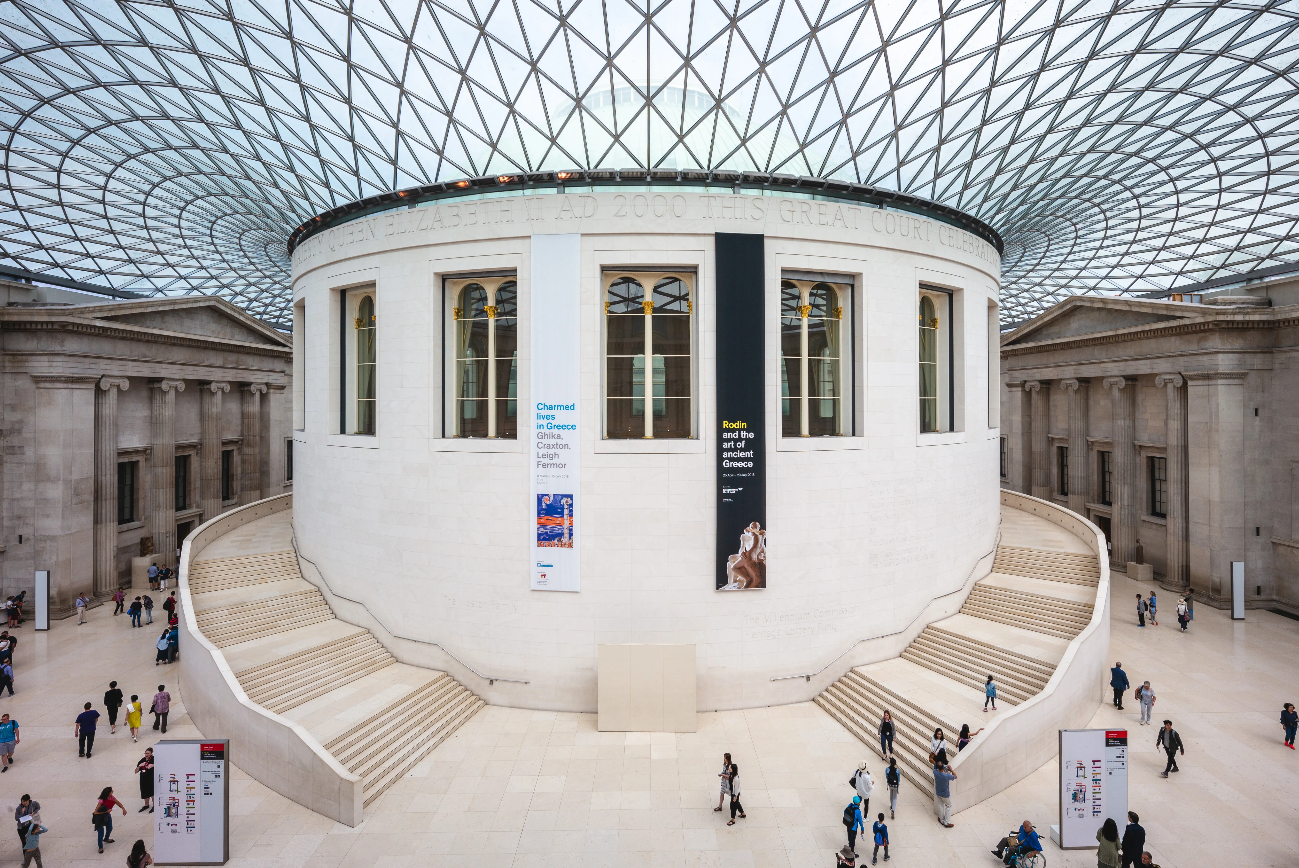 An architectural interior photograph shows the Queen Elizabeth II Great Court at the British Museum in London, United Kingdom