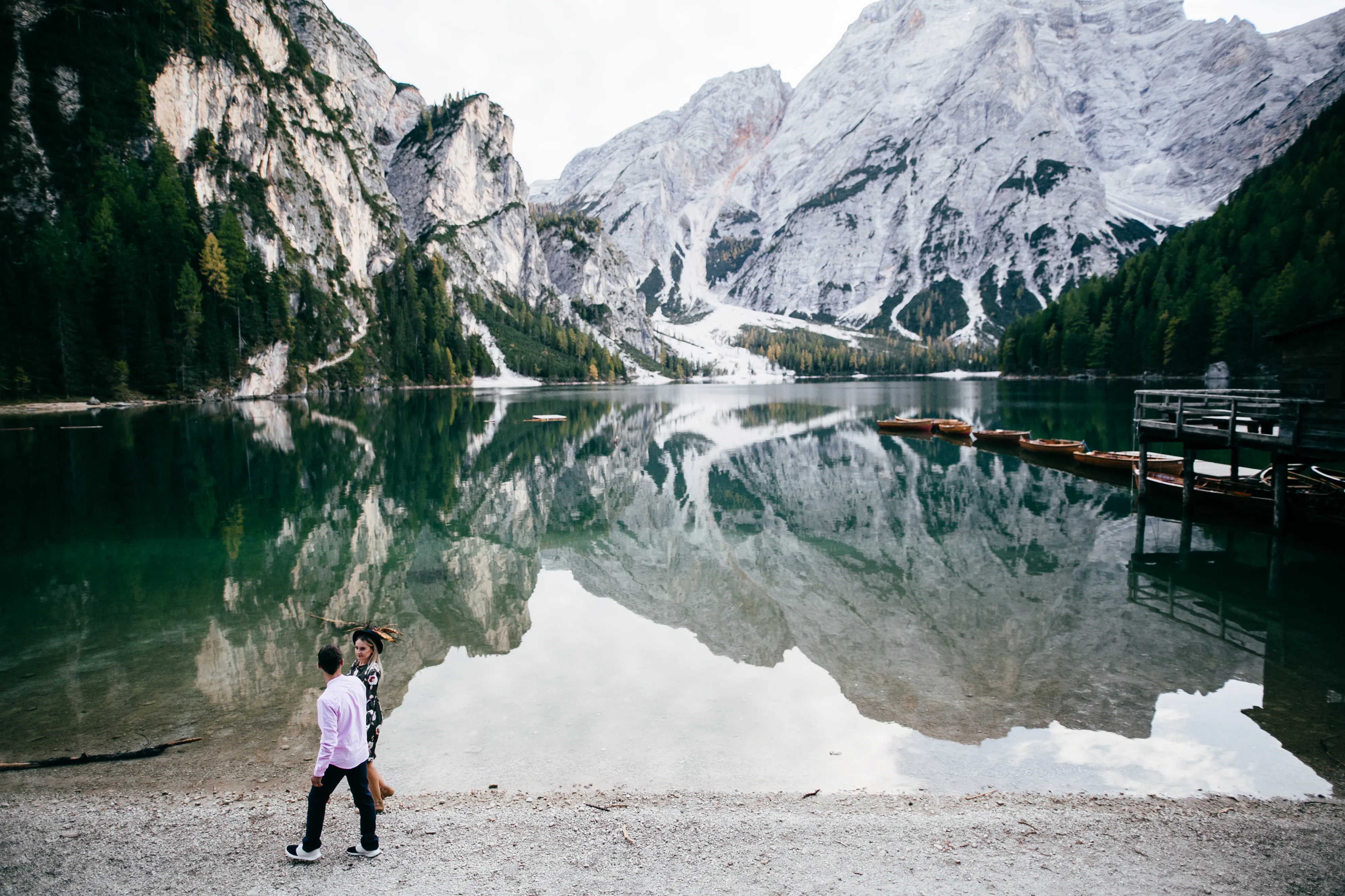 Lake Braies (Lago di Braies) in the Dolomites, Italy, during a cool, overcast day.