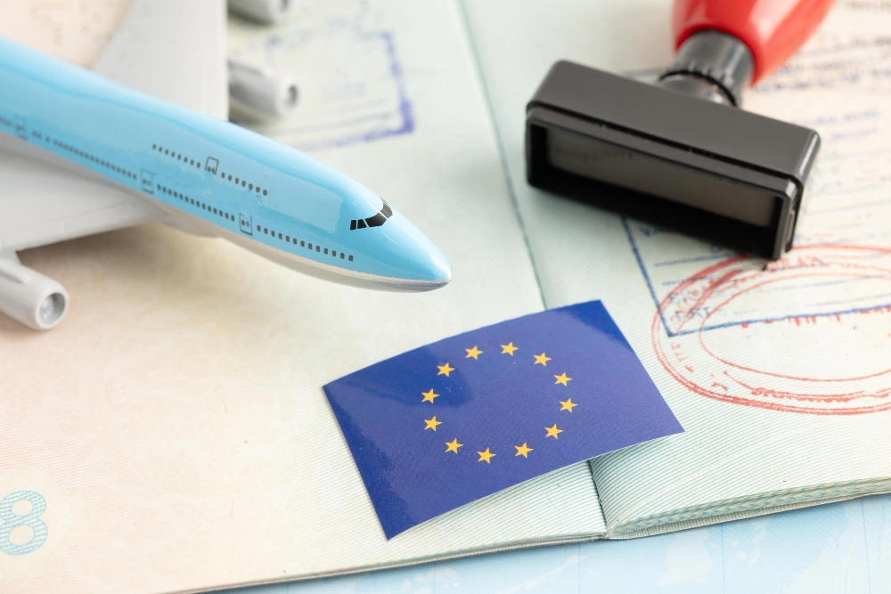Eu flag with approved stamp visa and passport document to immigration